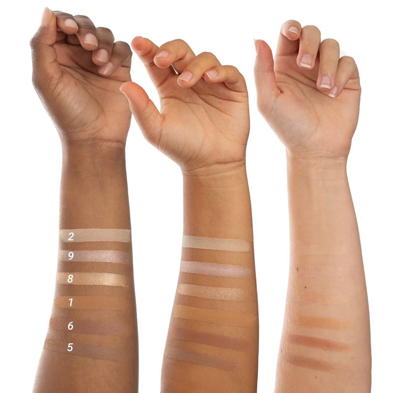 Arm swatches of Cheekbone Beauty assorted makeup colours.