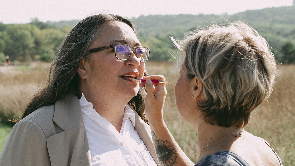 Applying Cheekbone Beauty's exclusive lip shade, Jodi